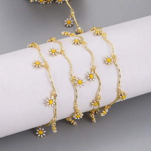 Golden stainless steel chain with white daisy enamel charms for DIY jewelry making