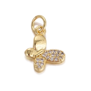Detailed view of a gold butterfly pendant with sparkling zircon micro-pave setting