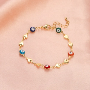 Detailed view of colorful evil eye heart bracelet with gold plating and lobster clasp