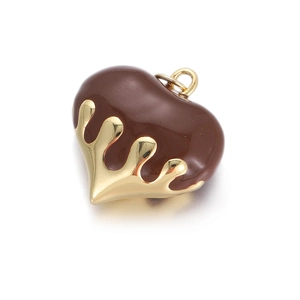Macro detail of chocolate brown enamel heart pendant with fluid gold-plated trim DIY charm
