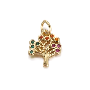 Detailed view of Tree of Life pendant with colorful zircons and golden metal finish