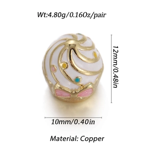 Detailed view of heart-shaped gold-plated copper bead with colorful enamel dots