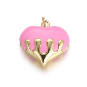 Close-up of pink heart enamel pendant with gold dripping metal design for DIY jewelry