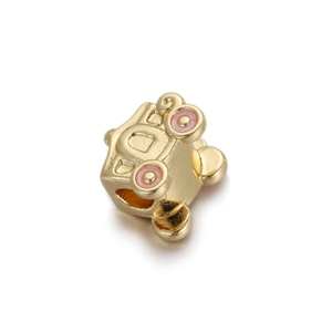 Detailed macro view of a gold-plated pumpkin coach bead with pink enamel wheels for jewelry