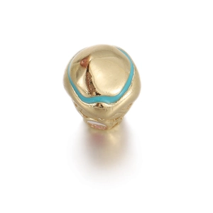 Detail view of gold plated heart spacer bead with blue enamel for DIY jewelry making