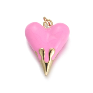 Detail of pink heart pendant with golden drip design and polished enamel finish