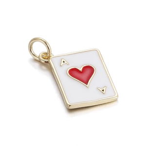 Macro view of gold plated Ace of Hearts poker pendant with red enamel for DIY jewelry