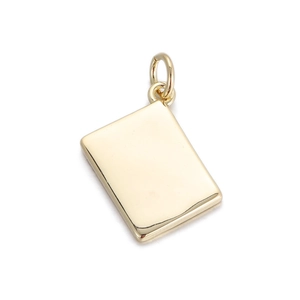Close-up of polished gold rectangular metal pendant for DIY jewelry making