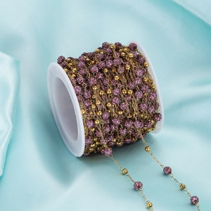 Gouden roestvrijstalen ketting met paarse glitterkralen op spoel voor DIY-sieraden