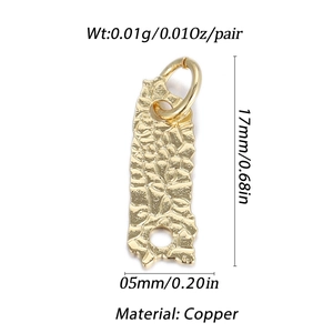 Detailed macro of 14K gold-plated copper heart pendant with unique hammered texture