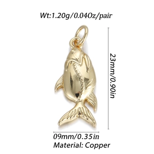 Detailed view of gold fish-shaped copper pendants with dimensions 23mm by 9mm