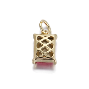 Elegant gold-tone geometric pendant with red gemstone and decorative hollow grid back