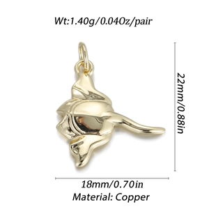 Detailed view of a golden stingray charm made of copper with specific size and weight