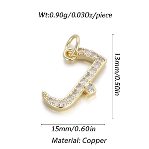Detail of 14K gold plated J-letter copper pendant with white zircons for jewelry making