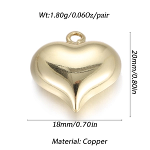 Macro shot of a 14K gold-plated heart pendant with dimensions and weight specs