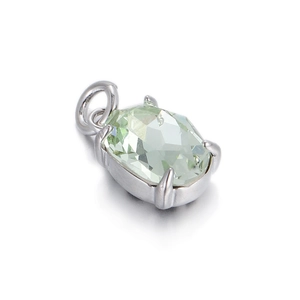 Close-up of light green faceted gemstone pendant with silver prong setting for DIY jewelry