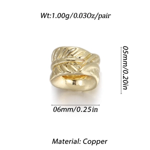 Macro detail of 14K gold-plated copper feather ear cuffs showing texture and dimensions
