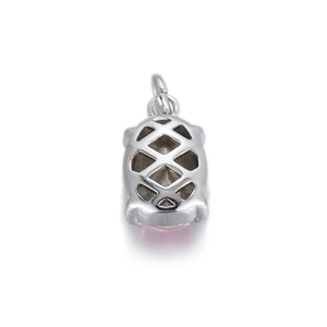 Detail of silver geometric pendant with pink stone and hollow mesh back for DIY jewelry