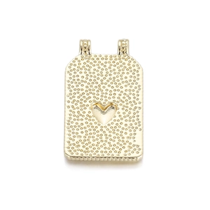 Close-up of a 14K gold plated rectangular pendant with embossed heart and dot texture