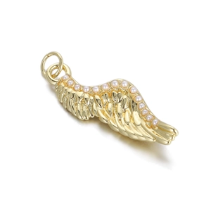 Detail of 14K gold plated wing charm with white pearls and fine feather texture