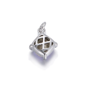 Detailed back view of a silver geometric pendant featuring a hollow mesh design