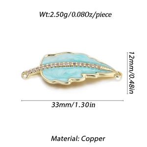 Detail view of leaf-shaped jewelry connector with blue enamel, crystals, and size specs