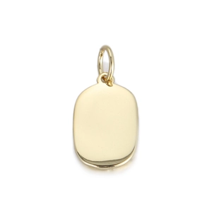 Close-up of a polished gold oval metal pendant charm with a simple top loop