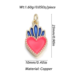 Pink enamel heart pendant in copper with gold beaded edges and blue star accents