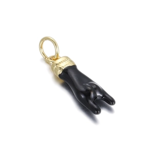 Detail of 14K gold plated rock hand gesture pendant with black enamel finish and ring hook