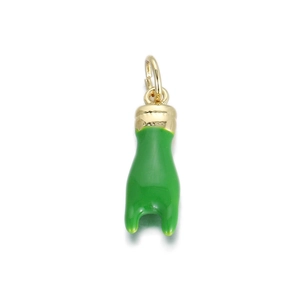 Detailed view of green enamel tooth pendant with gold cap and ring for DIY jewelry