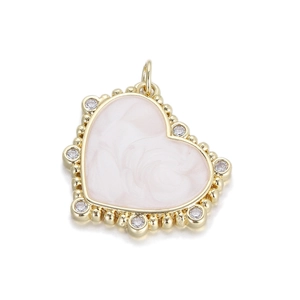 Polished 14K gold plated heart pendant with pink marble texture and sparkling zircons