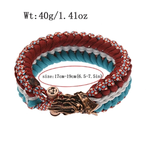 Detail of paracord bracelet with bronze octopus buckle and adjustable size info