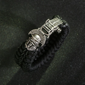 Tactical paracord survival bracelet with silver Spartan helmet skull and metal clasp