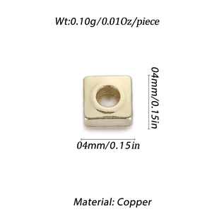 Detailed macro view of a 4mm gold-plated copper cube bead with technical dimensions