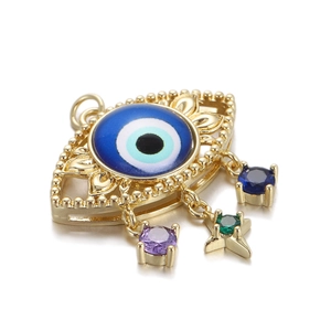 Macro shot of 14K gold-plated evil eye pendant with colorful dangling gemstone charms