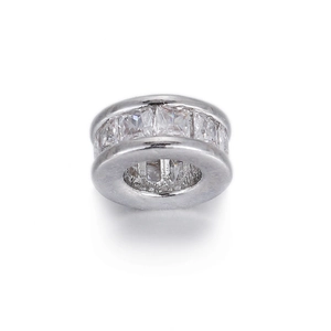 Detailed view of silver charm bead featuring step-cut cubic zirconia in circular setting