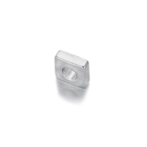 Macro shot of square metal spacer bead for DIY jewelry with center hole detail