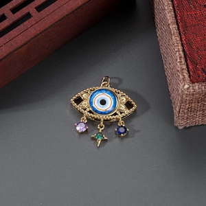 Detailed close-up of 14K gold plated evil eye pendant with colorful gemstone charms