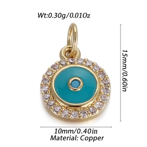 Detail view of 10mm brass evil eye charm with blue enamel and white cubic zirconia