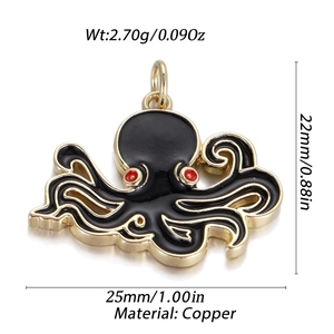 Detailed view of octopus pendant with gold copper finish and black enamel inlays
