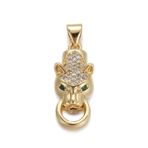Detailed macro view of gold leopard head pendant with white zircon and green stone eyes