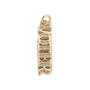 Detailed view of a gold-plated MOTHER pendant with micro-pave cubic zirconia settings