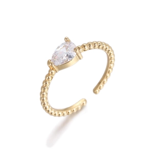 Elegante anillo abierto dorado con circón de corte pera y textura de banda de cuentas