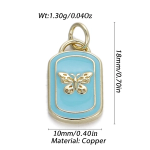 Detail view of gold copper butterfly pendant with dimensions 18mm by 10mm and weight 1.30g
