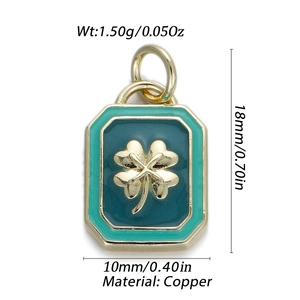 Macro detail of 18mm gold clover enamel charm pendant weighing 1.50g for DIY jewelry