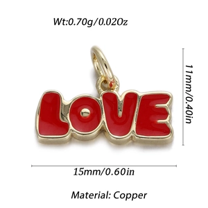 Macro view of 14K gold plated LOVE heart pendant with red enamel inlay details
