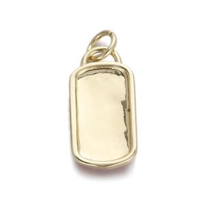 Detailed view of rectangular gold-plated pendant with polished finish and dual jump rings