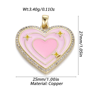 Detailed view of pink heart pendant in copper with tiny crystals and gold stars