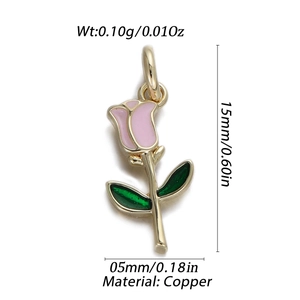 Detailed size view of tulip-shaped 14K gold brass pendant with pink enamel and green leaves