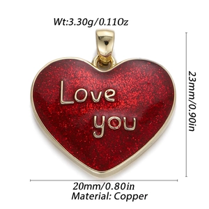 Detail of red glitter heart pendant with gold Love You text and copper material specs
